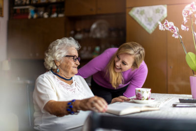 nurse talking to senior